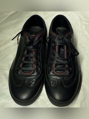 Gucci Black Leather Sneakers with Red Stripe Accents
EU 6.5